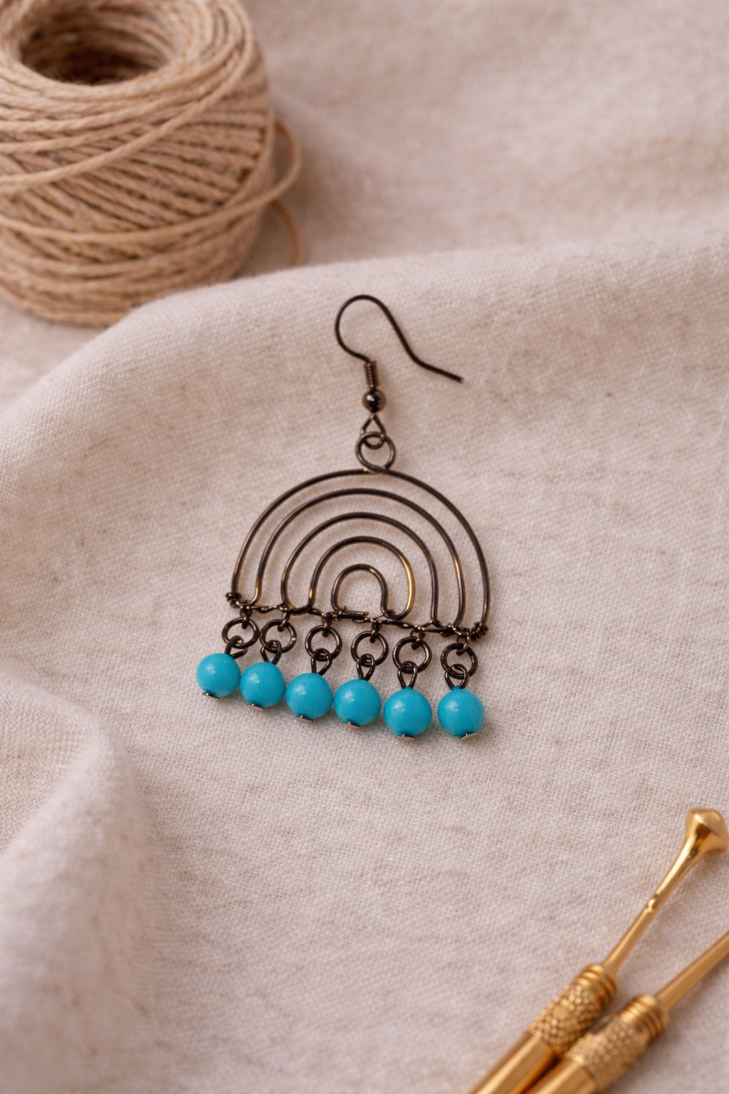 Handcrafted Arc Drop Earrings with Blue Bead Accents