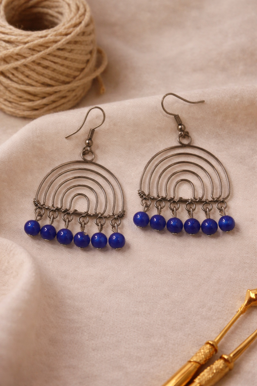Layered Arc Earrings with Blue Bead Drops