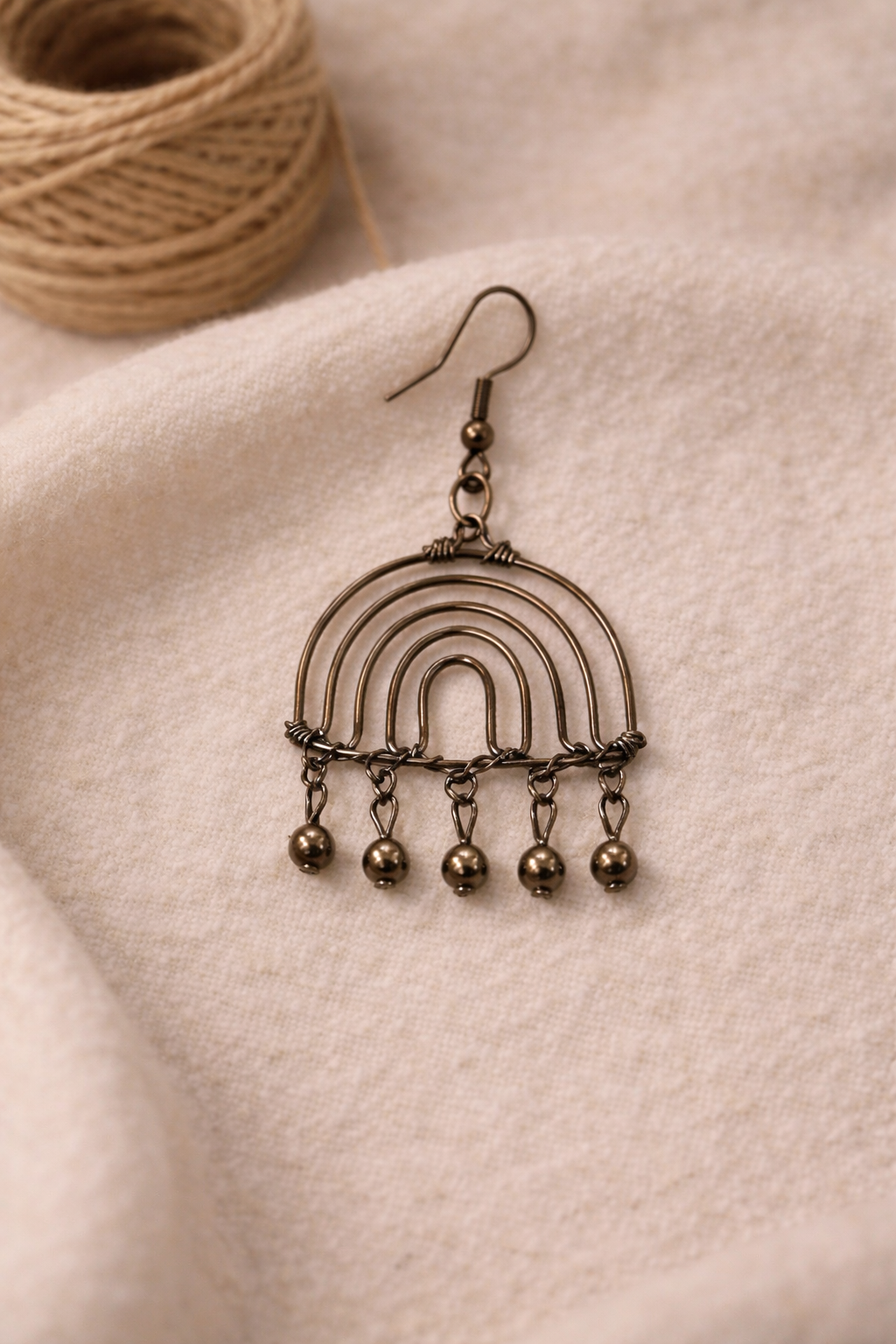 Handcrafted Arch Drop Earrings with Metal Bead Detailing