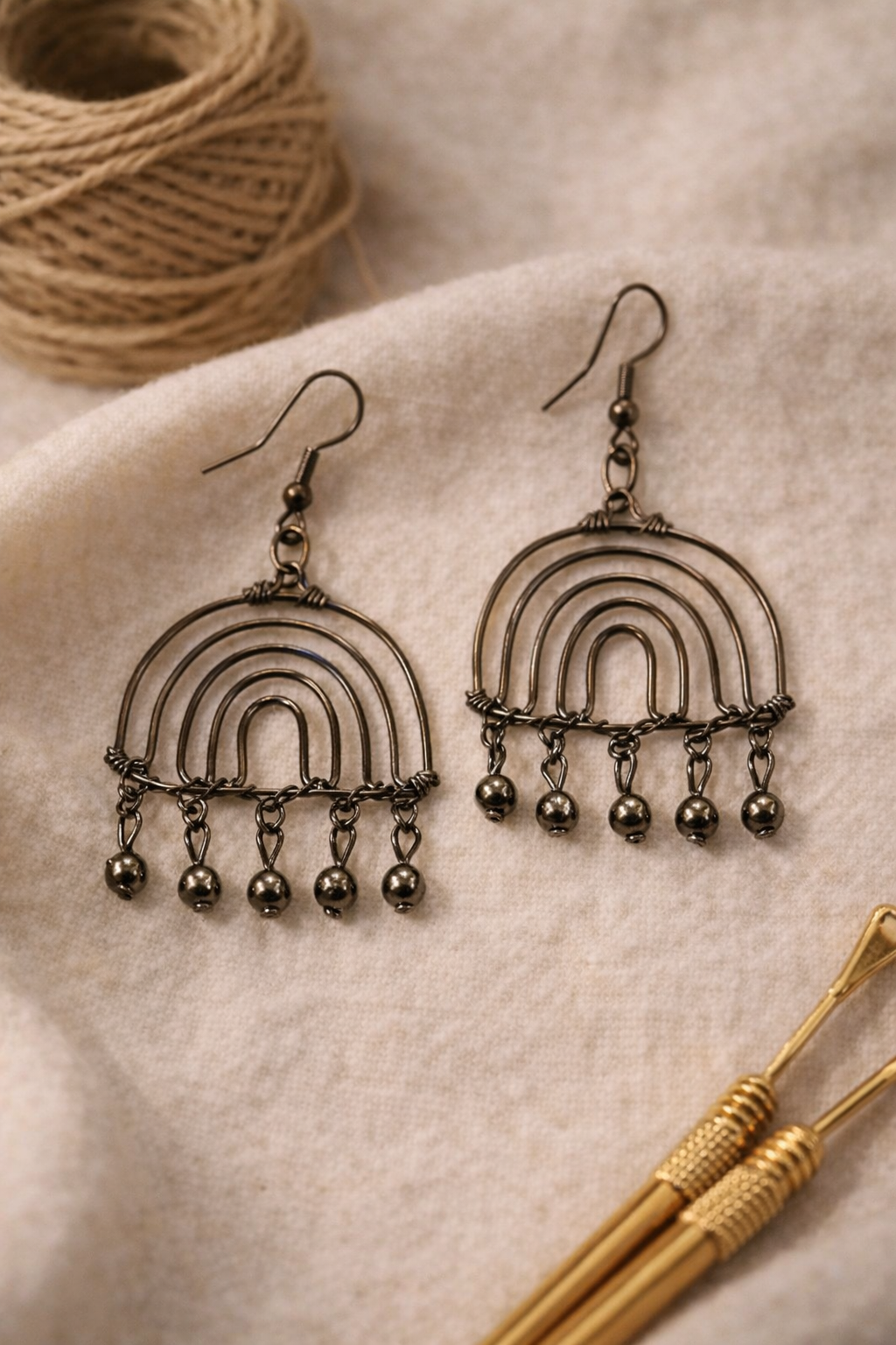 Handcrafted Arch Drop Earrings with Metal Bead Detailing